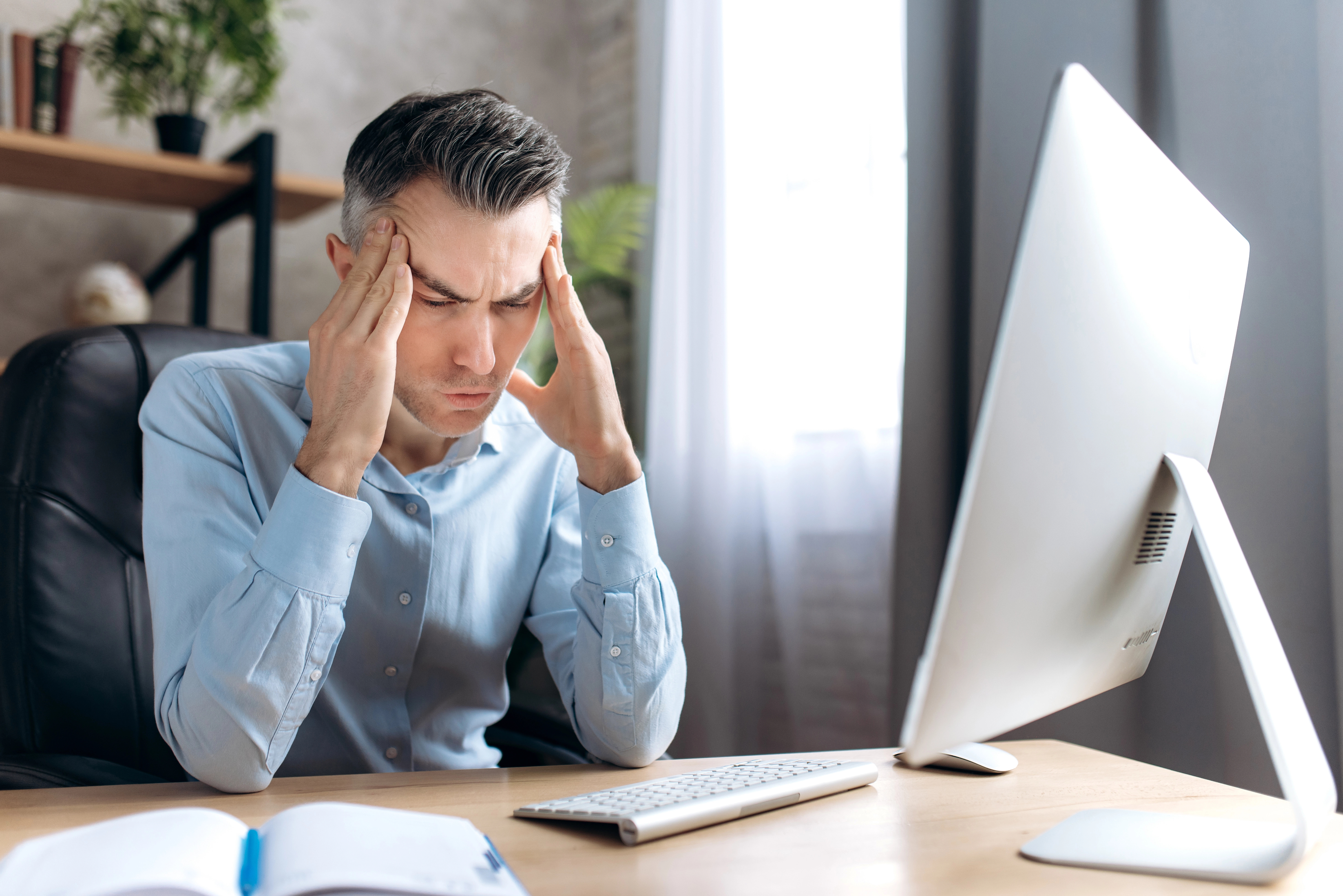 Business owner overwhelmed by manual work