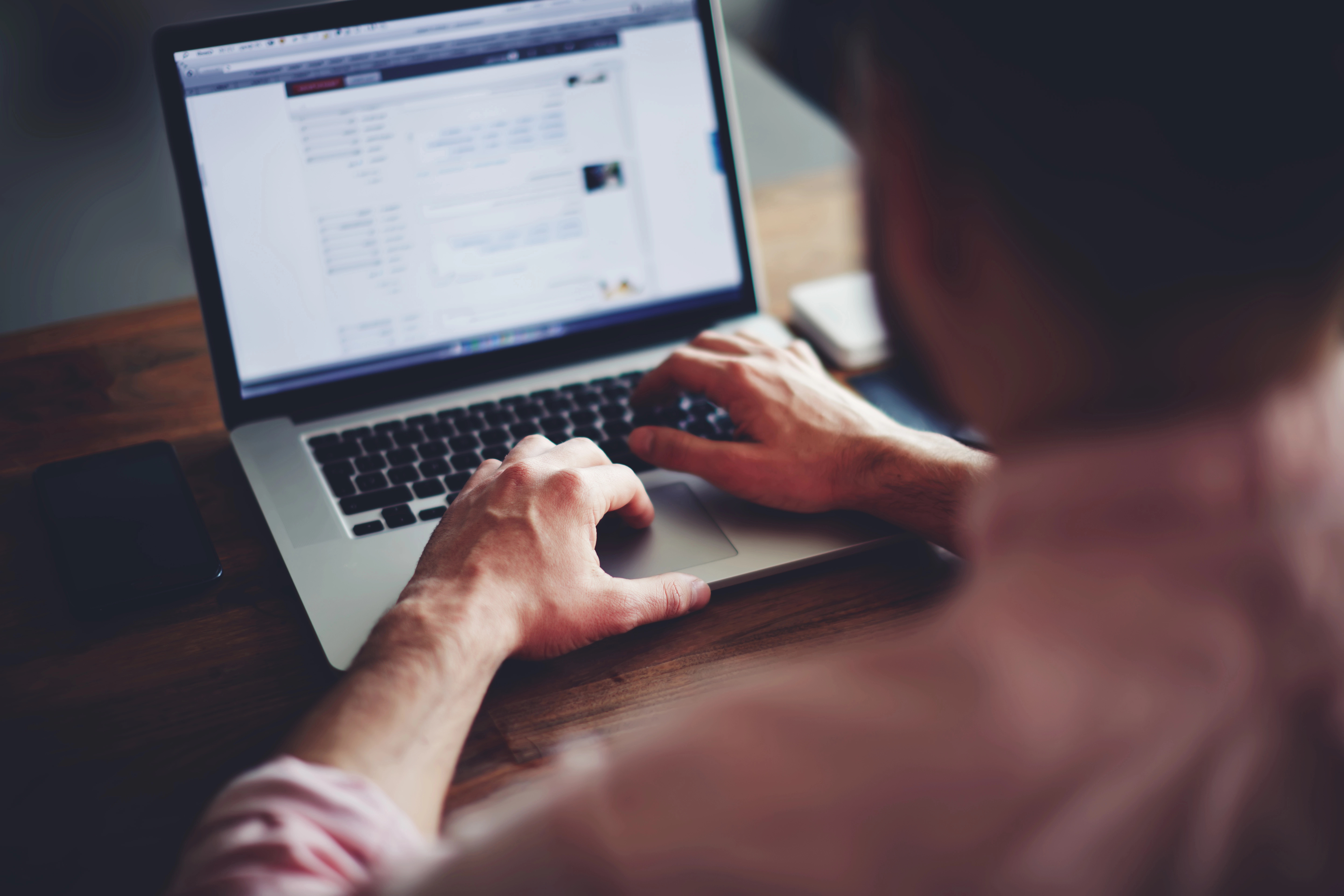 Business professional working on laptop